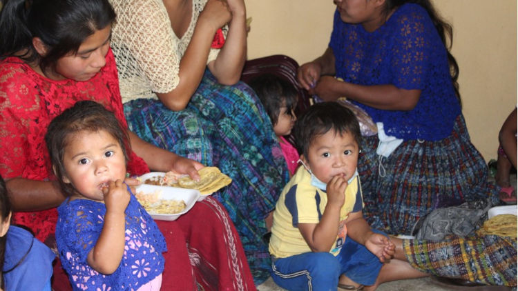Evacuees receiving a meal